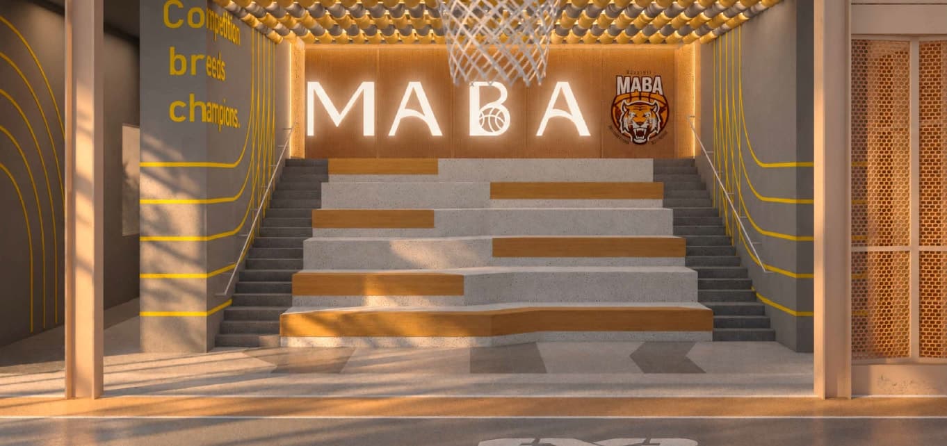 MABA Court with tiered seating and a glowing MABA sign